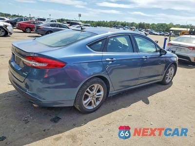 Trzecie zdjęcie samochodu z tyłu: 2018 FORD FUSION SE VIN:3FA6P0HD4JR265833 - miniatura
