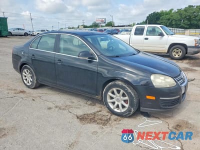 Czwarte zdjęcie samochodu z boku: 2009 VOLKSWAGEN JETTA SE VIN:3VWRZ71K69M161126 - miniatura