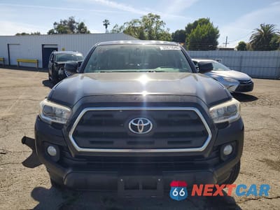 Piąte zdjęcie samochodu w środku: 2016 TOYOTA TACOMA SR5 V6 VIN:3TMBZ5DN9GM003729 - miniatura