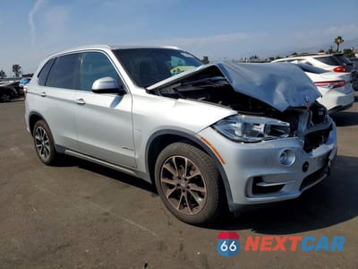 Czwarte zdjęcie samochodu z boku: 2018 BMW X5 SDRIVE35I VIN:5UXKR2C58J0Z14045 - miniatura