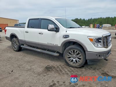 Czwarte zdjęcie samochodu z boku: 2018 NISSAN TITAN XD PLATINUM RESERVE VIN:1N6BA1F49JN549624 - miniatura