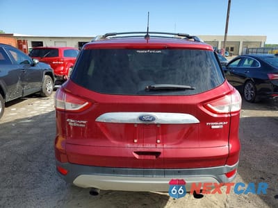 Zdjęcie 6 z 13 samochodu: 2016 FORD ESCAPE TITANIUM VIN:1FMCU9JX4GUC77900 - miniatura
