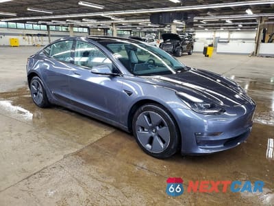 Czwarte zdjęcie samochodu z boku: 2023 TESLA MODEL 3 VIN:5YJ3E1EA0PF457862 - miniatura