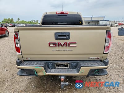 Zdjęcie 6 z 12 samochodu: 2021 GMC CANYON AT4 VIN:1GTG6FEN3M1206059 - miniatura
