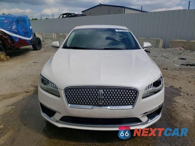 Piąte zdjęcie samochodu w środku: 2017 LINCOLN MKZ PREMIERE VIN:3LN6L5A95HR614139 - miniatura
