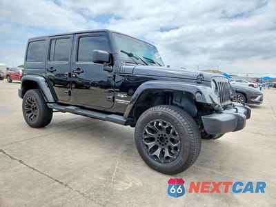 Czwarte zdjęcie samochodu z boku: 2017 JEEP WRANGLER UNLIMITED SAHARA VIN:1C4BJWEG3HL696314 - miniatura