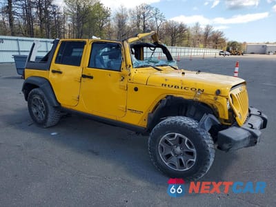 Czwarte zdjęcie samochodu z boku: 2015 JEEP WRANGLER UNLIMITED RUBICON VIN:1C4BJWFG9FL566243 - miniatura