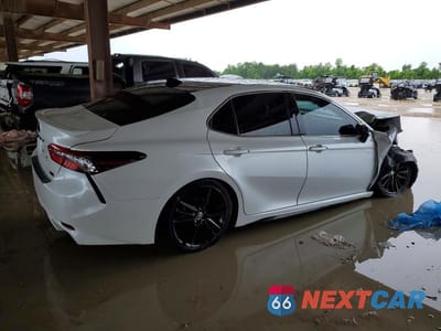 Trzecie zdjęcie samochodu z tyłu: 2024 TOYOTA CAMRY XSE VIN:4T1K61AK8RU845127 - miniatura