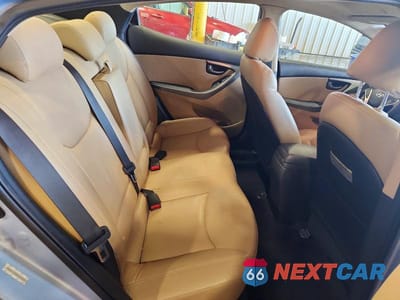 Zdjęcie 10 z 12 samochodu: 2012 HYUNDAI ELANTRA LIMITED VIN:KMHDH4AE0CU432902 - miniatura