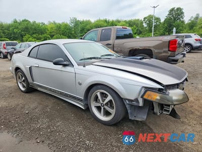 Czwarte zdjęcie samochodu z boku: 2004 FORD MUSTANG VIN:1FAFP40614F205983 - miniatura