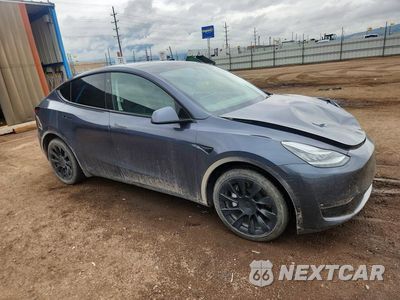 Czwarte zdjęcie samochodu z boku: 2023 TESLA MODEL Y VIN:7SAYGDEE4PF601680 - miniatura