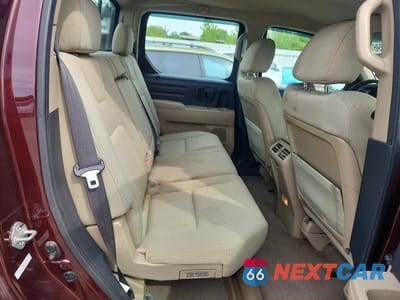 Zdjęcie 10 z 12 samochodu: 2010 HONDA RIDGELINE RT VIN:5FPYK1F20AB012350 - miniatura