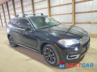 Czwarte zdjęcie samochodu z boku: 2017 BMW X5 XDR40E VIN:5UXKT0C33H0V96365 - miniatura