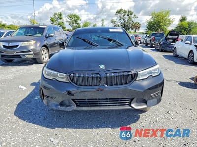 Piąte zdjęcie samochodu w środku: 2020 BMW 330I VIN:3MW5R1J02L8B21457 - miniatura