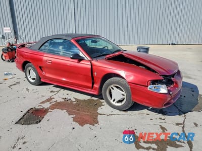 Czwarte zdjęcie samochodu z boku: 1997 FORD MUSTANG VIN:1FALP4445VF182950 - miniatura