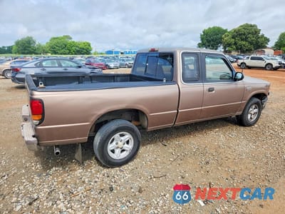 Trzecie zdjęcie samochodu z tyłu: 1994 MAZDA B4000 CAB PLUS VIN:4F4CR16X3RTM08587 - miniatura
