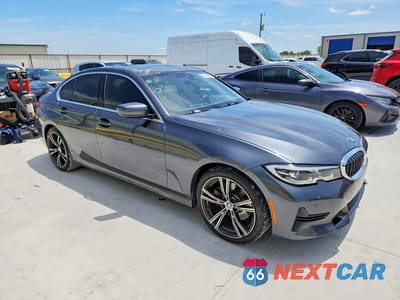 Czwarte zdjęcie samochodu z boku: 2021 BMW 330I VIN:3MW5R1J08M8B53203 - miniatura