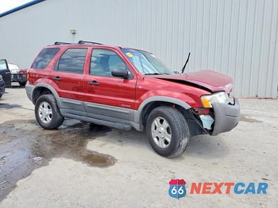 Czwarte zdjęcie samochodu z boku: 2001 FORD ESCAPE XLT VIN:1FMYU031X1KA16400 - miniatura