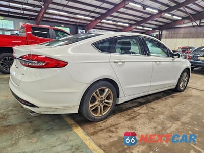 Trzecie zdjęcie samochodu z tyłu: 2018 FORD FUSION SE VIN:3FA6P0H75JR117300 - miniatura
