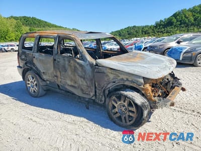 Czwarte zdjęcie samochodu z boku: 2011 DODGE NITRO HEAT VIN:1D4PU4GX8BW511584 - miniatura