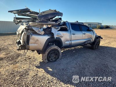 Trzecie zdjęcie samochodu z tyłu: 2018 TOYOTA TACOMA TRD OFF-ROAD VIN:3TMDZ5BN6JM042135 - miniatura