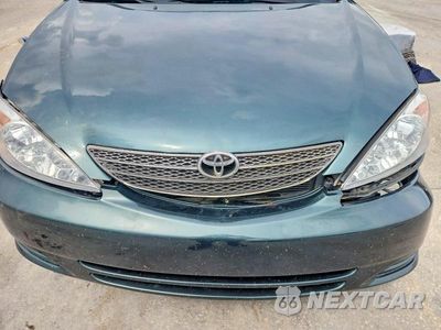 Zdjęcie 11 z 12 samochodu: 2003 TOYOTA CAMRY LE V6 VIN:4T1BF32K83U546626 - miniatura