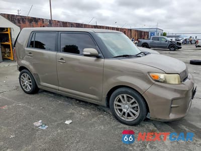 Czwarte zdjęcie samochodu z boku: 2011 TOYOTA SCION XB VIN:JTLZE4FE7B1129017 - miniatura