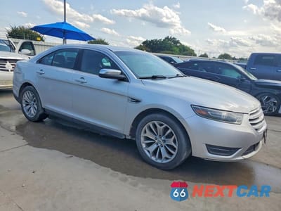 Czwarte zdjęcie samochodu z boku: 2014 FORD TAURUS LIMITED VIN:1FAHP2F85EG163481 - miniatura