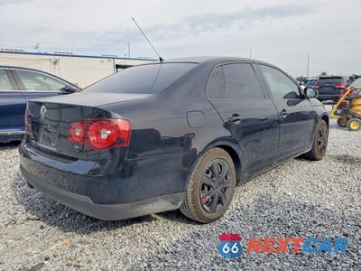 Trzecie zdjęcie samochodu z tyłu: 2009 VOLKSWAGEN JETTA S VIN:3VWJZ71K09M143833 - miniatura
