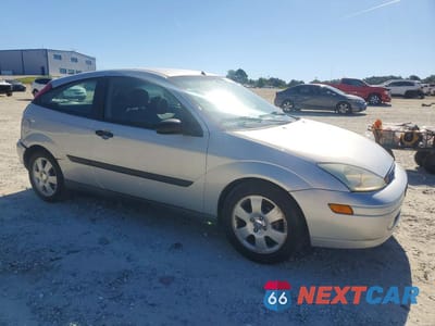 Czwarte zdjęcie samochodu z boku: 2002 FORD FOCUS ZX3 VIN:3FAFP31332R225165 - miniatura