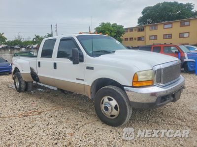 Czwarte zdjęcie samochodu z boku: 1999 FORD F350 SUPER DUTY VIN:1FTWW33FXXEE22509 - miniatura