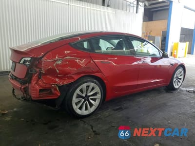 Trzecie zdjęcie samochodu z tyłu: 2023 TESLA MODEL 3 VIN:5YJ3E1EA8PF435902 - miniatura