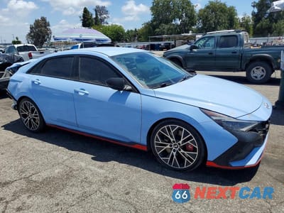 Czwarte zdjęcie samochodu z boku: 2022 HYUNDAI ELANTRA N BASE VIN:KMHLW4AK0NU008839 - miniatura