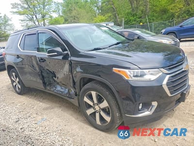 Czwarte zdjęcie samochodu z boku: 2019 CHEVROLET TRAVERSE LT VIN:1GNEVHKW4KJ153556 - miniatura