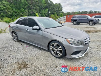 Czwarte zdjęcie samochodu z boku: 2014 MERCEDES-BENZ E 350 VIN:WDDHF5KB0EA831485 - miniatura