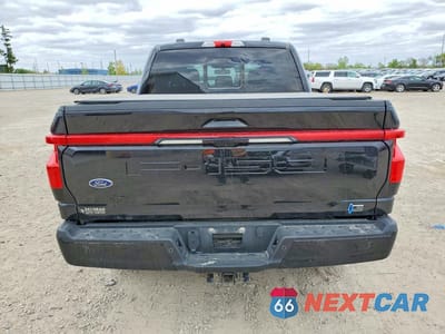 Zdjęcie 6 z 12 samochodu: 2022 FORD F150 LIGHTNING PRO VIN:1FT6W1EVXNWG10821 - miniatura
