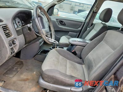 Zdjęcie 7 z 13 samochodu: 2003 FORD ESCAPE VIN:1FMYU92183KA01595 - miniatura
