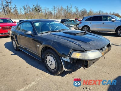 Czwarte zdjęcie samochodu z boku: 1999 FORD MUSTANG VIN:1FAFP4040XF145388 - miniatura