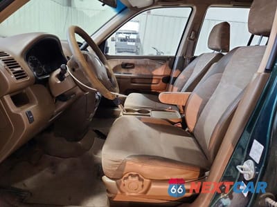 Zdjęcie 7 z 13 samochodu: 2003 HONDA CR-V LX VIN:JHLRD68463C011368 - miniatura