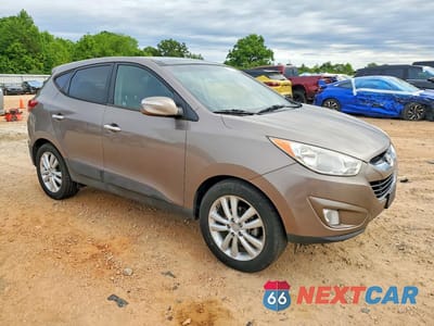 Czwarte zdjęcie samochodu z boku: 2011 HYUNDAI TUCSON LIMITED VIN:KM8JU3AC4BU197992 - miniatura
