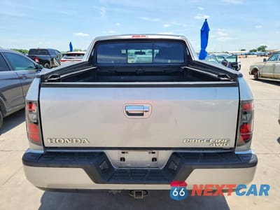 Zdjęcie 6 z 12 samochodu: 2014 HONDA RIDGELINE SPORT VIN:5FPYK1F72EB011993 - miniatura