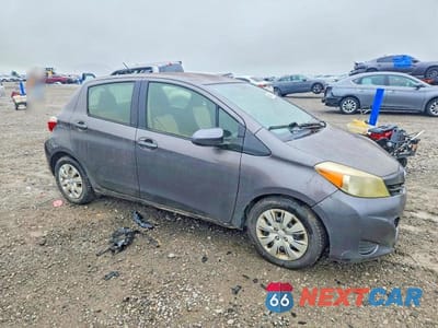 Czwarte zdjęcie samochodu z boku: 2013 TOYOTA YARIS 5-DOOR L VIN:JTDKTUD35DD549073 - miniatura