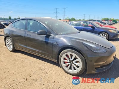 Czwarte zdjęcie samochodu z boku: 2023 TESLA MODEL 3 VIN:5YJ3E1EB2PF673544 - miniatura