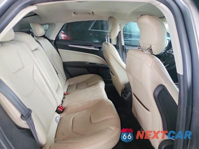 Zdjęcie 10 z 12 samochodu: 2014 FORD FUSION TITANIUM VIN:3FA6P0D9XER290629 - miniatura