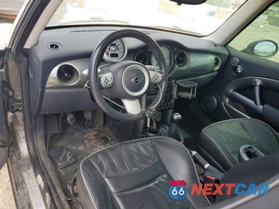 Zdjęcie 8 z 12 samochodu: 2006 MINI COOPER VIN:WMWRC33536TK71324 - miniatura