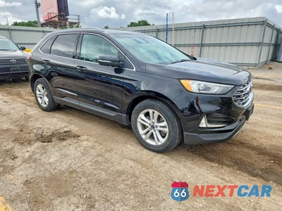 Czwarte zdjęcie samochodu z boku: 2020 FORD EDGE SEL VIN:2FMPK4J90LBA44611 - miniatura