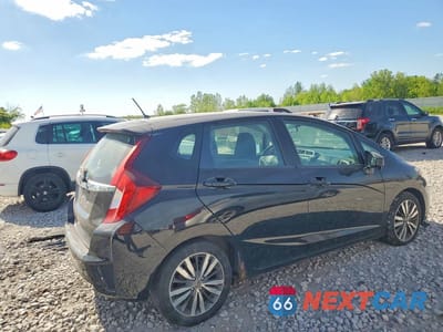Trzecie zdjęcie samochodu z tyłu: 2015 HONDA FIT EX VIN:3HGGK5H87FM702503 - miniatura