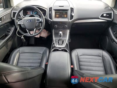 Zdjęcie 8 z 13 samochodu: 2015 FORD EDGE SEL VIN:2FMTK4J91FBB72200 - miniatura