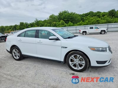 Czwarte zdjęcie samochodu z boku: 2014 FORD TAURUS SEL VIN:1FAHP2E83EG149760 - miniatura