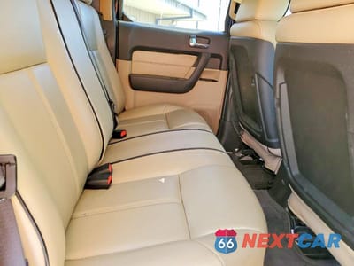 Zdjęcie 10 z 12 samochodu: 2009 HUMMER H3T VIN:5GNEN13EX98129902 - miniatura